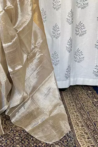 Beige zari border tissue kasavu saree with blouse piece