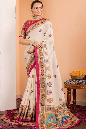 Cream ethnic motifs silk blend saree