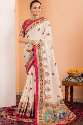 Cream ethnic motifs silk blend saree