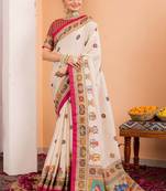 Cream ethnic motifs silk blend saree
