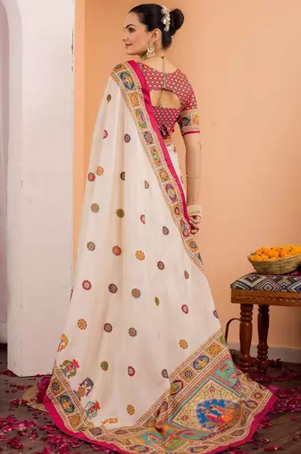 Cream ethnic motifs silk blend saree