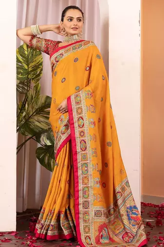 Mustard ethnic motifs silk blend saree