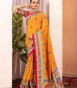 Mustard ethnic motifs silk blend saree