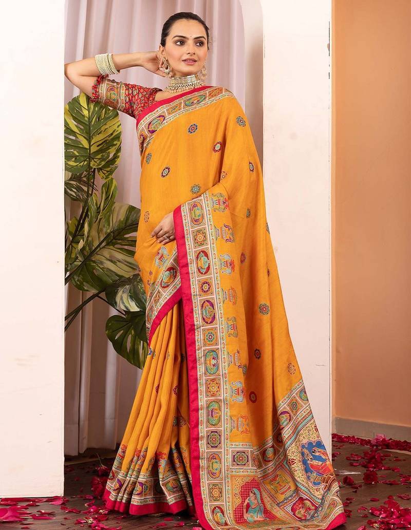 Mustard ethnic motifs silk blend saree