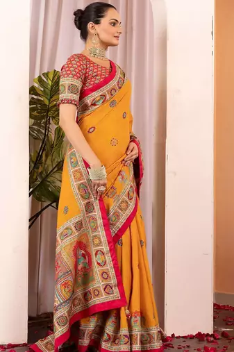 Mustard ethnic motifs silk blend saree