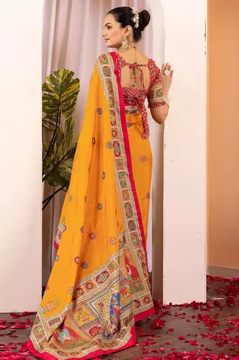 Mustard ethnic motifs silk blend saree