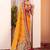 Mustard ethnic motifs silk blend saree