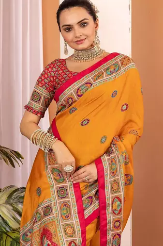 Mustard ethnic motifs silk blend saree