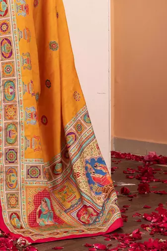 Mustard ethnic motifs silk blend saree