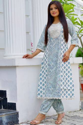 women ethnic motifs printed regular thread work kurta with trousers