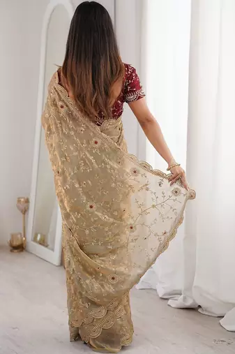 Gold floral satin heavy work saree