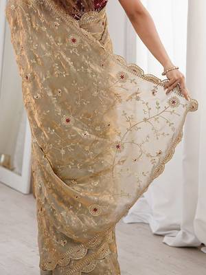 Gold floral satin heavy work saree 5
