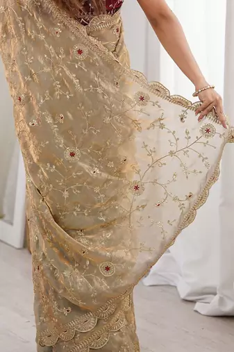 Gold floral satin heavy work saree
