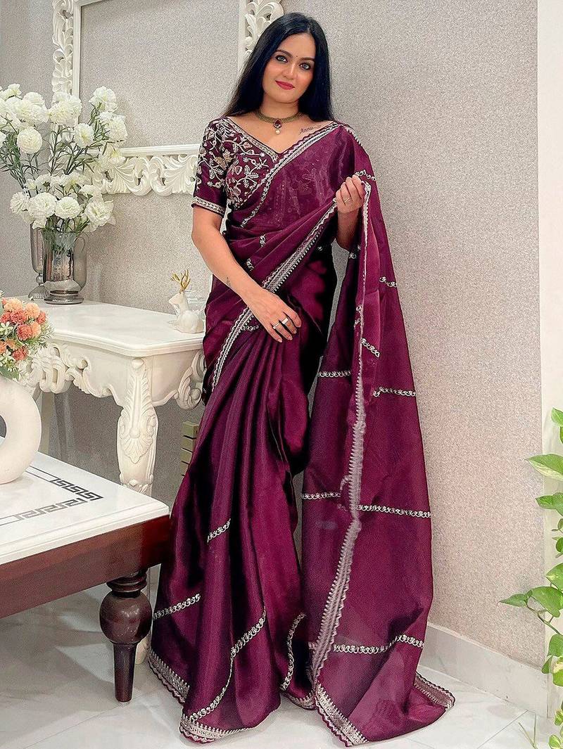 Purple embellished embroidered organza saree