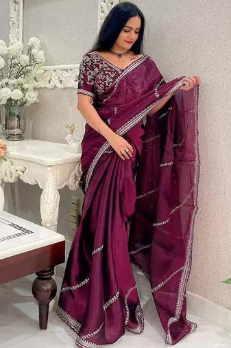 Purple embellished embroidered organza saree
