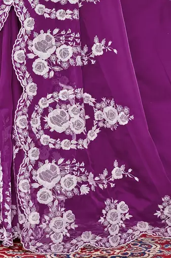 Purple ethnic embroidered organza saree