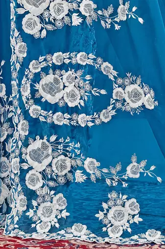 Blue floral embroidered organza saree