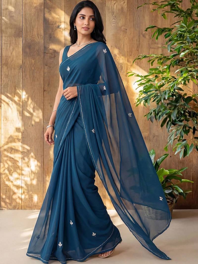 Teal floral embroidered poly georgette designer saree
