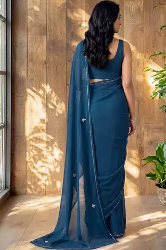 Teal floral embroidered poly georgette designer saree