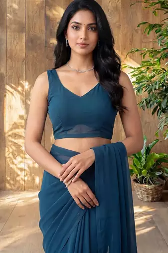 Teal floral embroidered poly georgette designer saree
