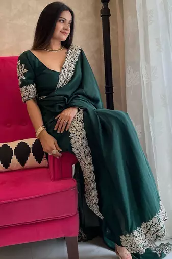 Green embroidered border saree