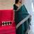 Green embroidered border saree