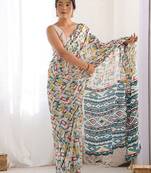 Cream printed mirror work embellished border saree