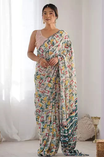 Cream printed mirror work embellished border saree