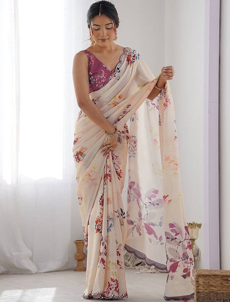 Cream floral printed embroidered mirror work saree