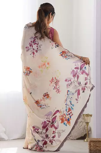 Cream floral printed embroidered mirror work saree