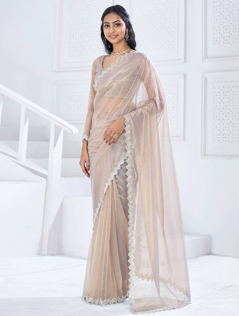 Beige embellished aari work organza saree