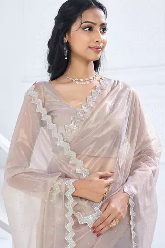Beige embellished aari work organza saree