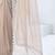 Beige embellished aari work organza saree