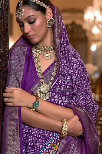 Purple ethnic motifs printed silk blend pochampally saree