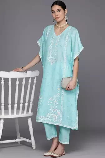 women floral printed regular thread work kurta with trousers