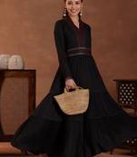 women tiered thread work kurta with trousers