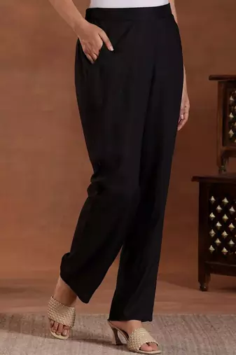 women tiered thread work kurta with trousers