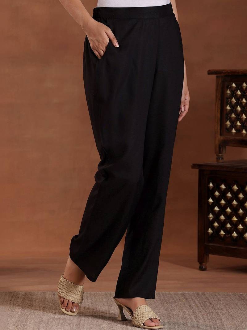women tiered thread work kurta with trousers
