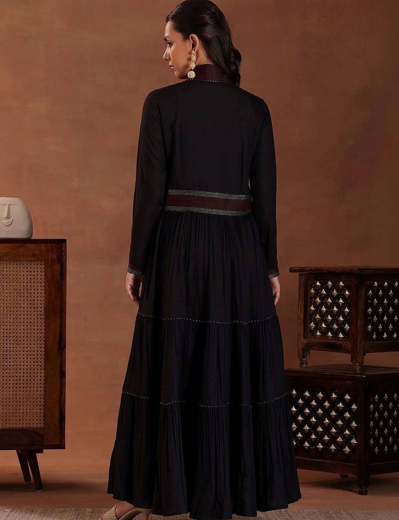 women tiered thread work kurta with trousers