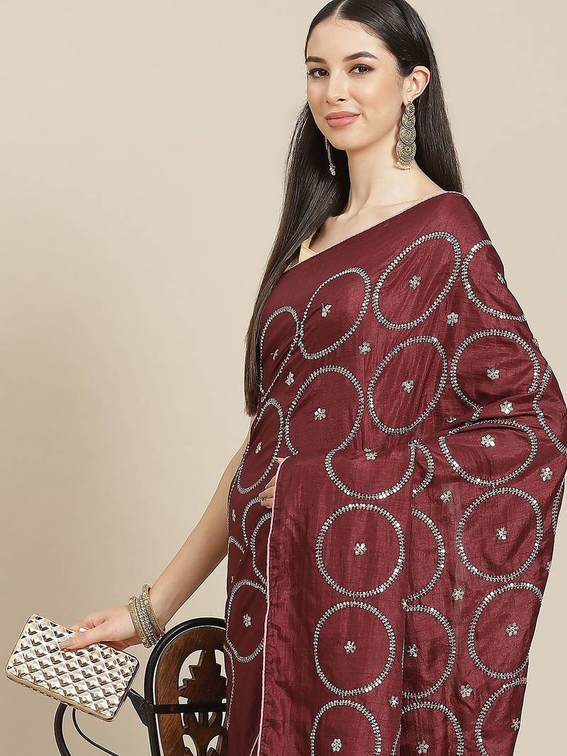 Maroon maroon & pink embellished sequinned silk blend saree