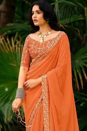 Orange striped printed sequinned  georgette saree