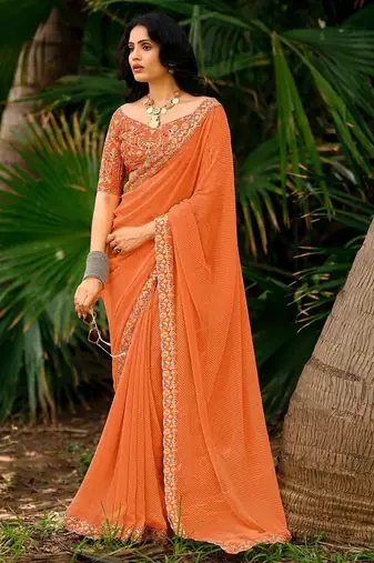 Orange striped printed sequinned  georgette saree