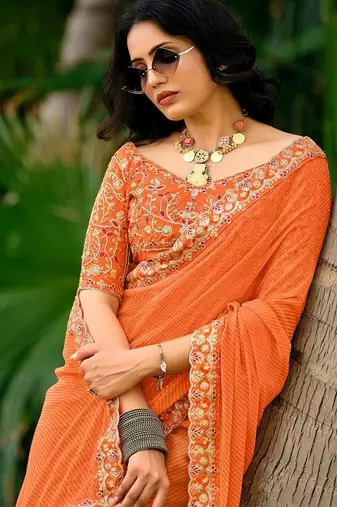 Orange striped printed sequinned  georgette saree