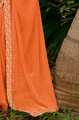 Orange striped printed sequinned  georgette saree
