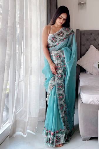 Teal floral embroidered organza saree