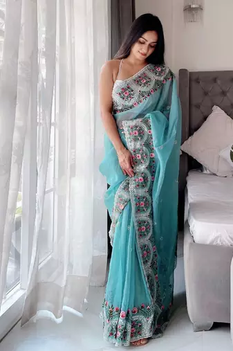 Teal floral embroidered organza saree
