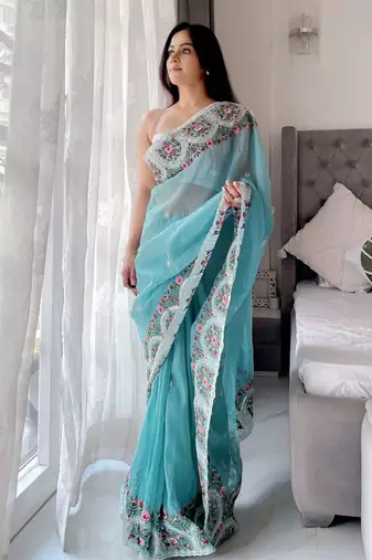 Teal floral embroidered organza saree