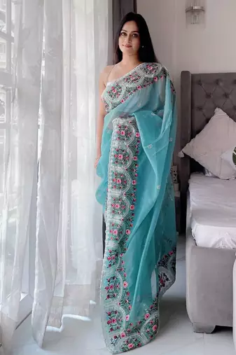 Teal floral embroidered organza saree