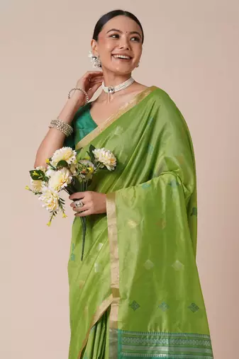 Green ethnic motifs zari silk blend banarasi saree