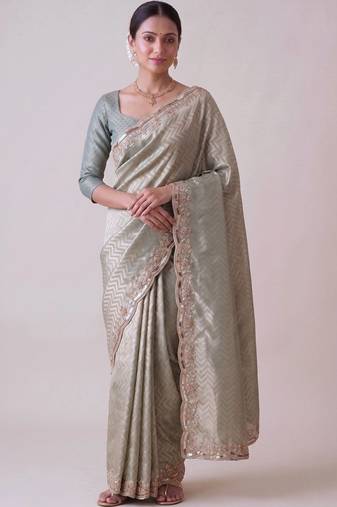 Sea green woven design zari silk blend banarasi saree